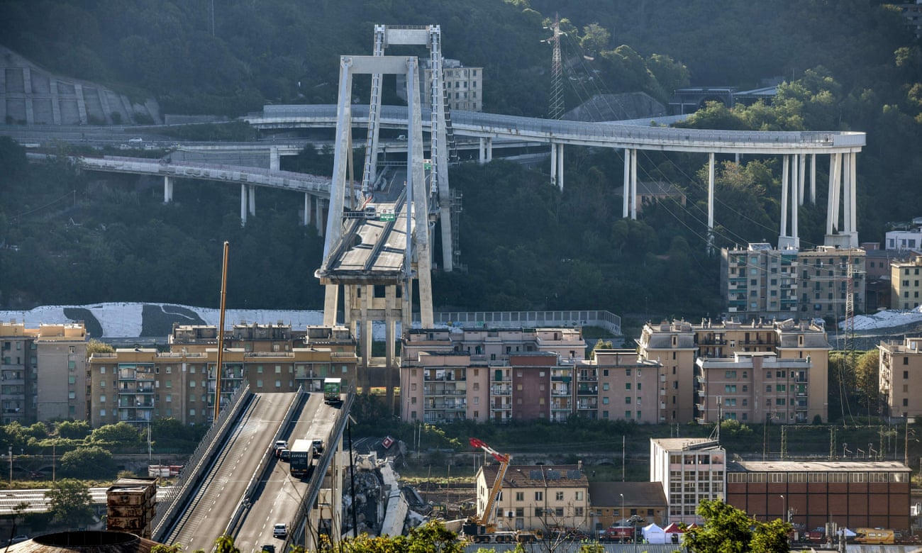 Abandoned vehicles on Morandi Bridge in Genoa after a section collapsed in August last year. 