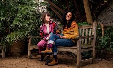 Vincent (left) and Ratinon laughing on garden bench