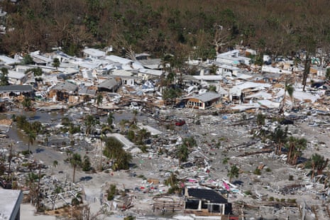 Aerial view of dozens of damaged houses