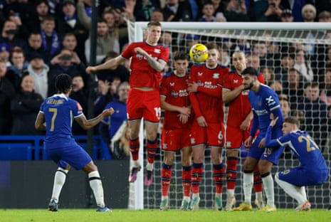 Chelsea’s Raheem Sterling scores their third goal from a free kick.