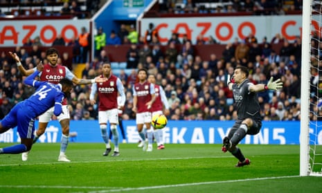 Leicester City's Kelechi Iheanacho scores their second goal past Aston Villa's Emiliano Martinez.