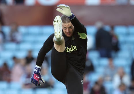 Everton goalkeeper Jordan Pickford gets his stretch on during the warm-up.