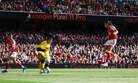 Arsenal’s Riccardo Calafiori scores their first goal.