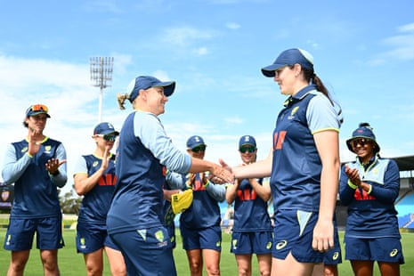 Alyssa Healy presents Lucy Hamilton with her first cap at Bellerive Oval.