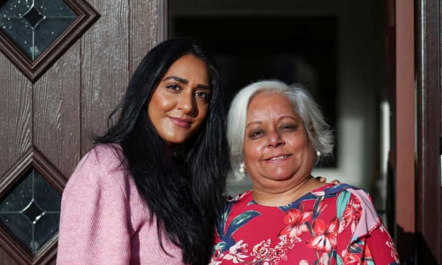 Bhavna Patel and her daughter Bindiya before their flight to New York to reunite with family.