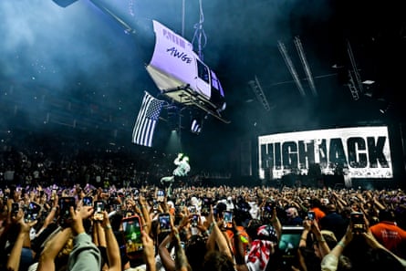A$AP Rocky's helicopter prop, with a huge crowd taking photos.