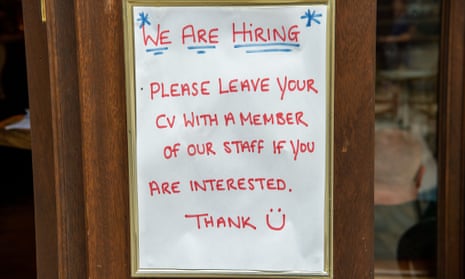 A sign outside a restaurant in Bracknell that reads: 'We are hiring. Please leave your cv with a member of our staff if you are interested. Thank you.'