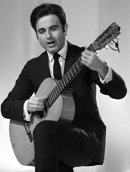 Guy Béart with guitar