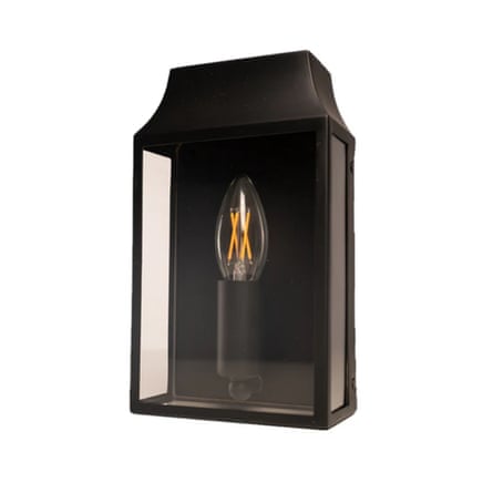 An outdoor light, candle-style fitting and bulb inside a glass box