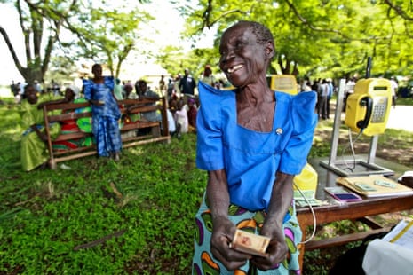 Uganda woman with cash transfer