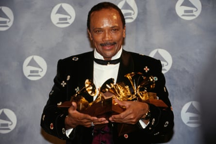 Quincy Jones, pictured in 1991 with a clutch of Grammy awards
