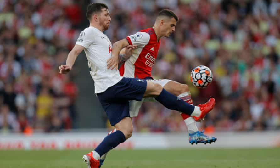 Granit Xhaka battles for the ball with Pierre-Emile Højbjerg.