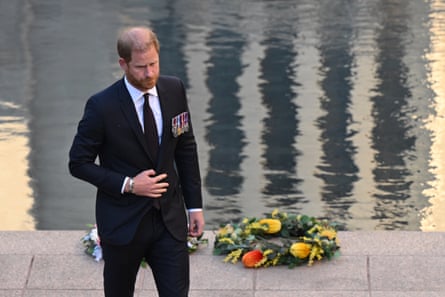Prince Harry lays a wreath as he attends the last post ceremony at the Australian war memorial in Canberra