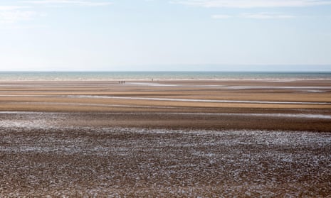 Low tide at Swansea beach, which has a 10-metre tide. The lagoon is the first large-scale attempt in Great Britain to harness the power of the tides.