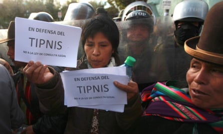 A protestor holds up a sign that reads in Spanish: ‘In defence of Tipnis – no to the illegal bill of consultation', during a rally outside the National Congress building in La Paz, 2012