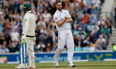 Chris Woakes of England celebrates after taking the wicket of Usman Khawaja of Australia for lbw.