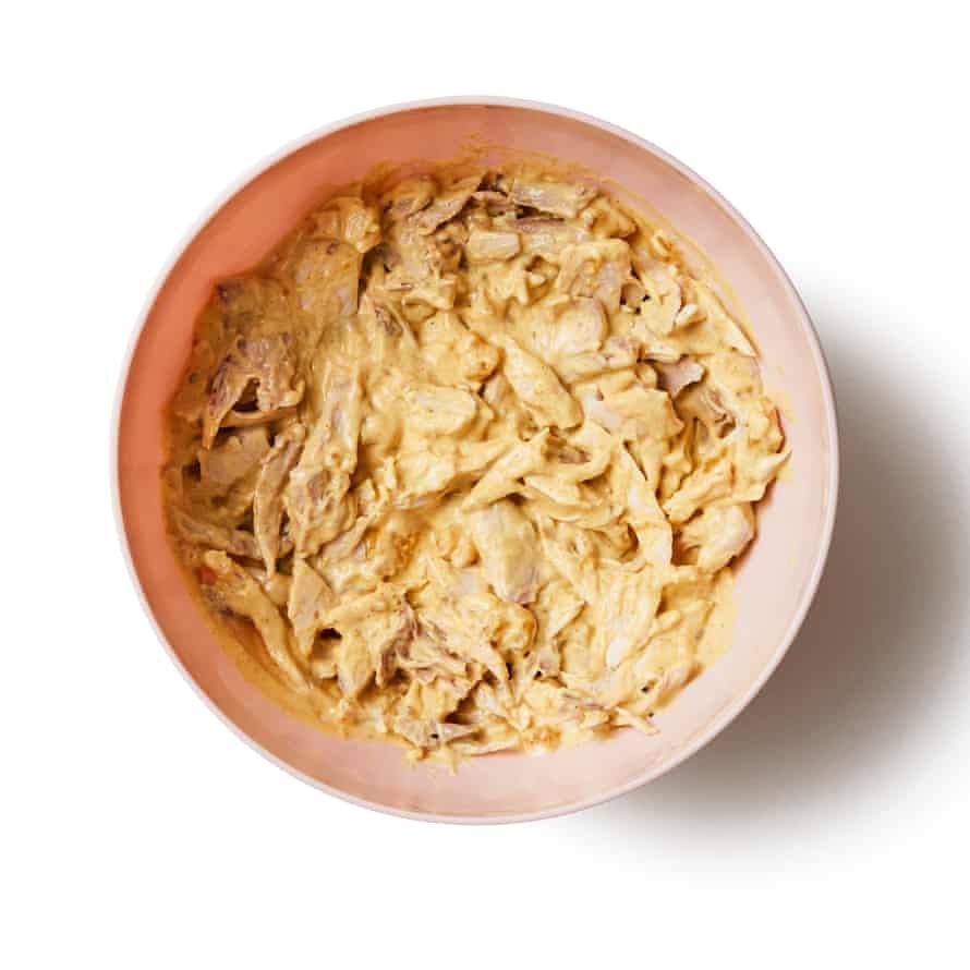 Felicity Cloake’s Coronation chicken 8bTo serve, roughly chop the coriander and stir most of it through the mix, keeping the rest aside as a garnish. Mound the coronation chicken on to a serving dish, then top with the almonds and remaining coriander. I like to pair it with warm basmati rice and a crisp green salad, but bread or new potatoes also work well.