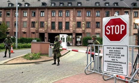 US soldiers stand guard at the entrance of the US Campbell Barracks in Heidelberg in 2002.