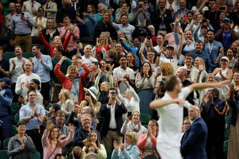 The spectators applaud Britain’s Andy Murray as he celebrates his win over Australia’s James Duckworth.