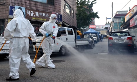 Health workers disinfect streets near Sarang Jeil Church in Seoul, which is at the centre of a recent resurgence of the coronavirus, ahead of the Chuseok holiday, which falls on 1 October, in Seoul, South Korea, 24 September 2020.