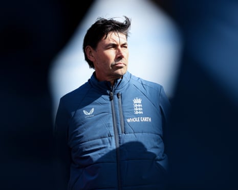 Stephen Fleming, England's Test coach, looks off to the side in a blue jacket