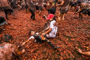 Children participate in the tenth annual Tomato Fight Festival, known as “Tomatina”, in Sutamarchan, Boyaca Department, Colombia