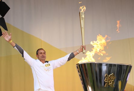 Sherwani lights the cauldron as the Olympic flame arrives in Stoke-on-Trent, 30 May 2012.