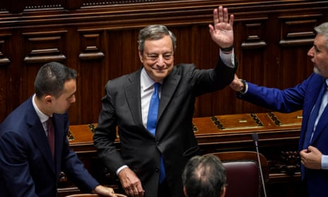Mario Draghi waves to lawmakers at the end of his speech to the Chamber of Deputies