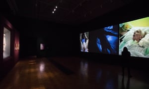 Bill Viola’s Nantes Triptych, 1992, right, opposite Michelangelo’s Taddei Tondo at the Royal Academy.