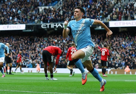 Phil Foden runs to take the acclaim of the fans after giving Manchester City the lead.