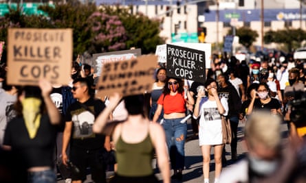 Hundreds of people protest following the death of George Floyd, in Los Angeles, California.