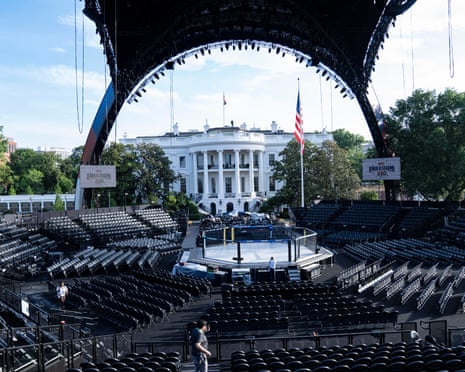 a view of the seating in the arena in an octagon shape with the White House behind it