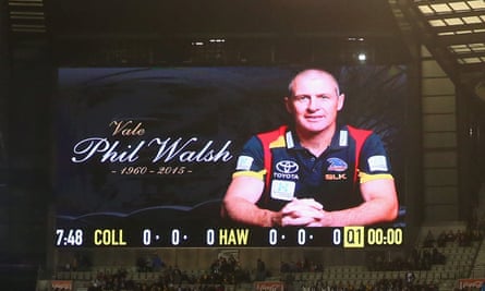 A tribute to Phil Walsh on the scoreboard during the round 14 AFL match between the Collingwood Magpies and the Hawthorn Hawks at Melbourne Cricket Ground.