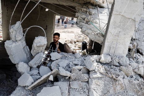 Palestinians inspect damage in the aftermath of an Israeli airstrike on Jenin camp in the occupied West Bank.