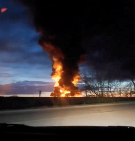 A still image from a video taken through a windshield, and shared on social media, reportedly shows a fire at energy facilities in Yartsevo, Smolensk region, on Wednesday.