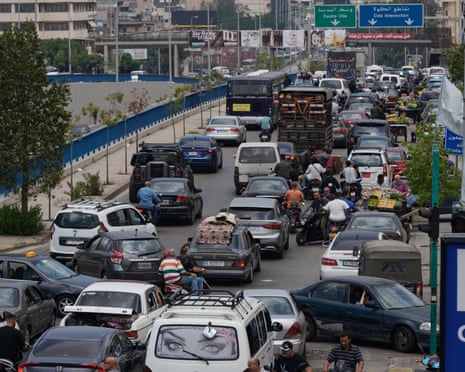 Traffic on a Beirut highway on Monday as residents flee after an Israeli threat to strike the southern suburbs