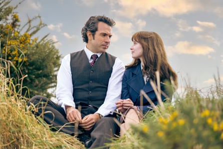 Tom Cullen and Lola Petticrew look into each other’s eyes while sitting in a field in Trespasses.