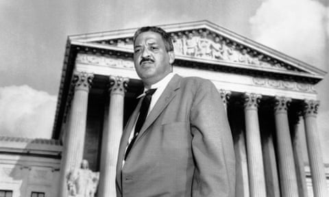 Thurgood Marshall, then NAACP chief counsel, in front of the supreme court.