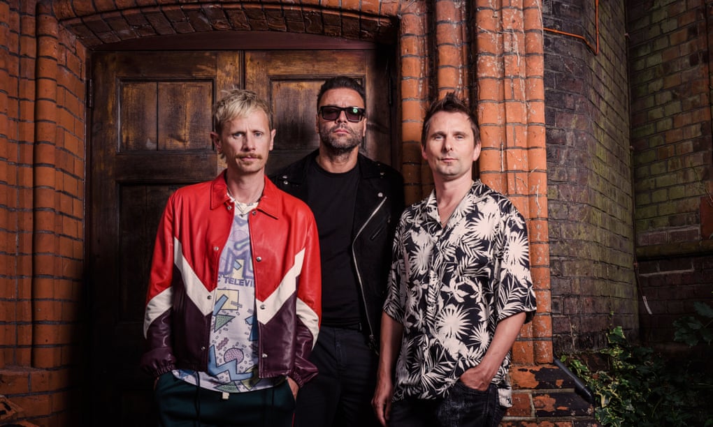‘We’re not really a pop group’ … Bellamy (right) with Muse bandmates Dominic Howard (left) and Chris Wolstenholme.