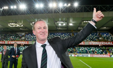 Michael O’Neill celebrates Northern Ireland’s win over Greece in a Euro 2016 qualifier.