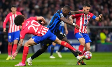 Inter Milan's Marcus Thuram (centre) fights for the ball with Atletico Madrid's Axel Witsel (left) and Koke during their Champions League last 16 second leg.
