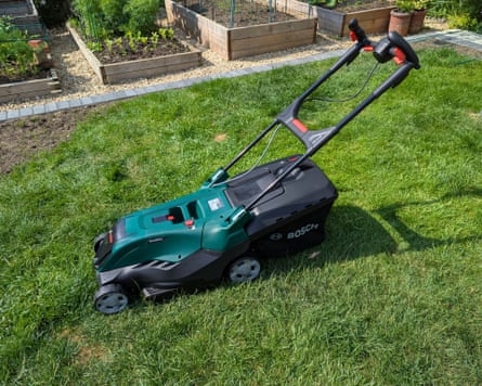 Bosch on the grass in a garden pictured from the side