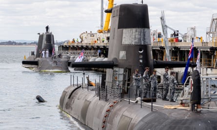 Australian Collins class submarine (front) and UK nuclear-powered attack submarine in Perth in 2021.
