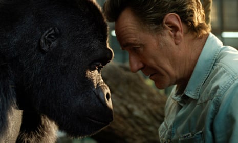Bryan Cranston with a gorilla named Ivan, voiced by Sam Rockwell, in a scene from The One and Only Ivan.