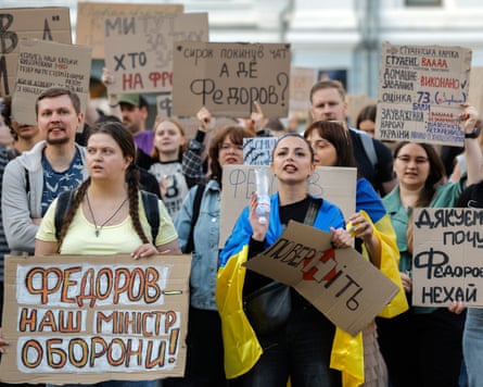 Ukrainians hold placards reading ‘Fedorov is the defence minister’, ‘Don’t mess with what works’, ‘Hands off Fedorov’ and ‘Bring Fedorov back’, among other messages, during a protest against the dismissal of Ukrainian Defence Minister Mykhailo Fedorov in downtown Kyiv, Ukraine