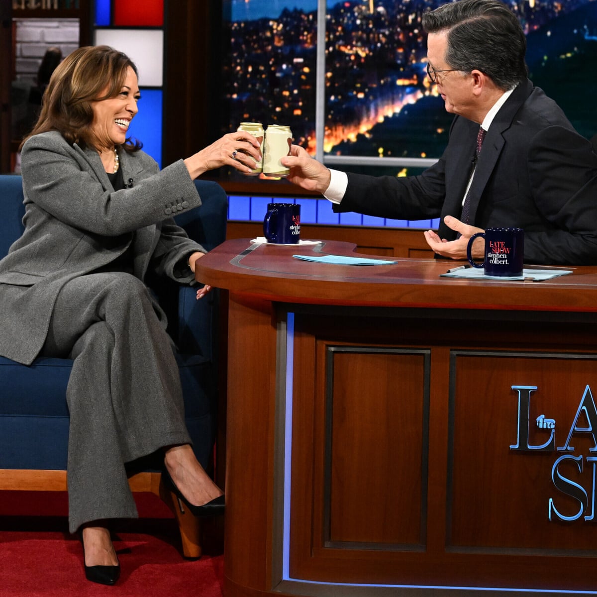 The high life: Kamala Harris cracks open a beer with Stephen Colbert | Kamala Harris | The Guardian