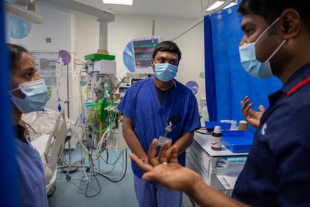 8.3oam finds Sebastian caring for a sedated and intubated patient while demonstrating techniques to two younger colleagues, Kiran Inti and Anju Joys