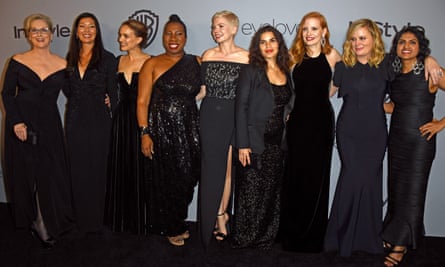 Actors and activists … Meryl Streep, Ai-jen Poo, Natalie Portman, Tarana Burke, Michelle Williams, America Ferrera, Jessica Chastain, Amy Poehler and Saru Jayaraman at the Golden Globes.