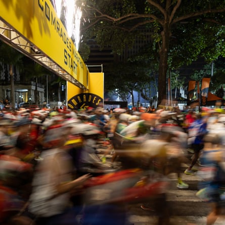 Blurred runners in the street