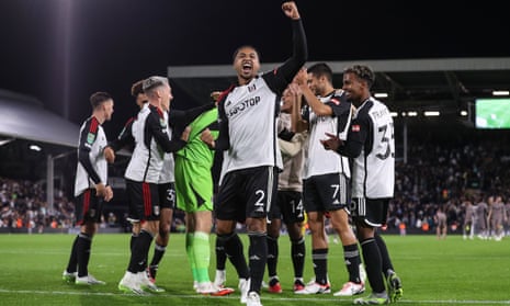 Kenny Tete of Fulham celebrates after scoring the winning penalty vs Spurs.